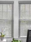Wood blinds in Laredo Pewter finish feature a sleek and modern design that adds sophistication.