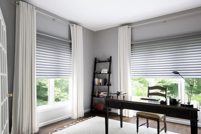 Drapery paired with Serenity sheer shades in a spacious home office. Drapery paired with Serenity sheer shades in a spacious home office.