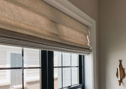 Inside mount roman shades in tan linen with light-filtering lining Inside mount roman shades in tan linen with light-filtering lining