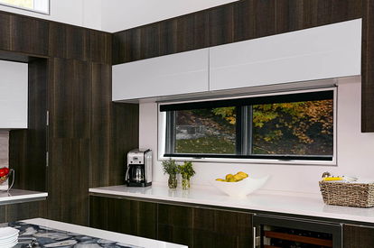 Black solar shades in a modern kitchen Black solar shades in a modern kitchen