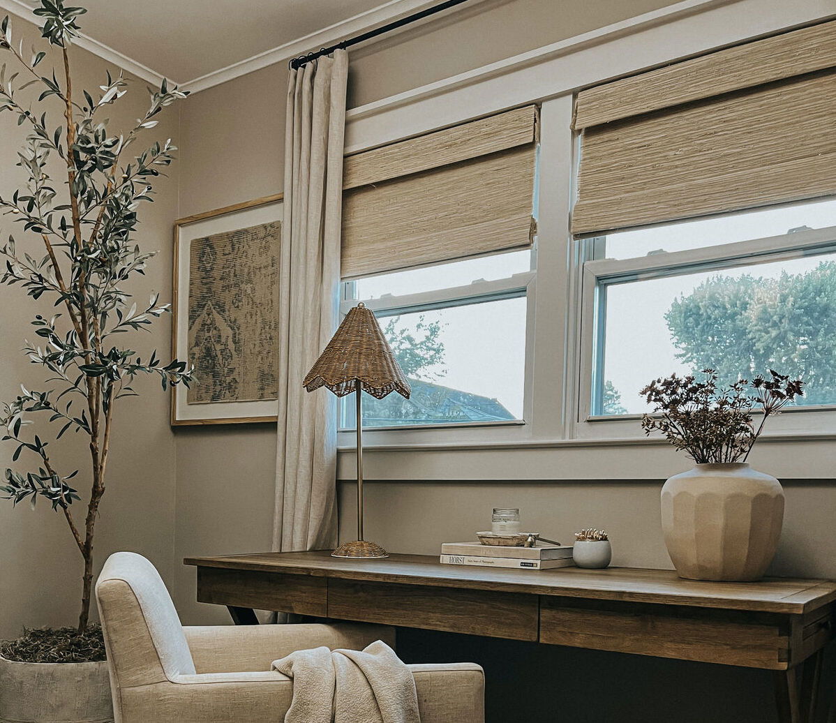 Woven wood shades paired with linen curtains Woven wood shades paired with linen curtainsOffices