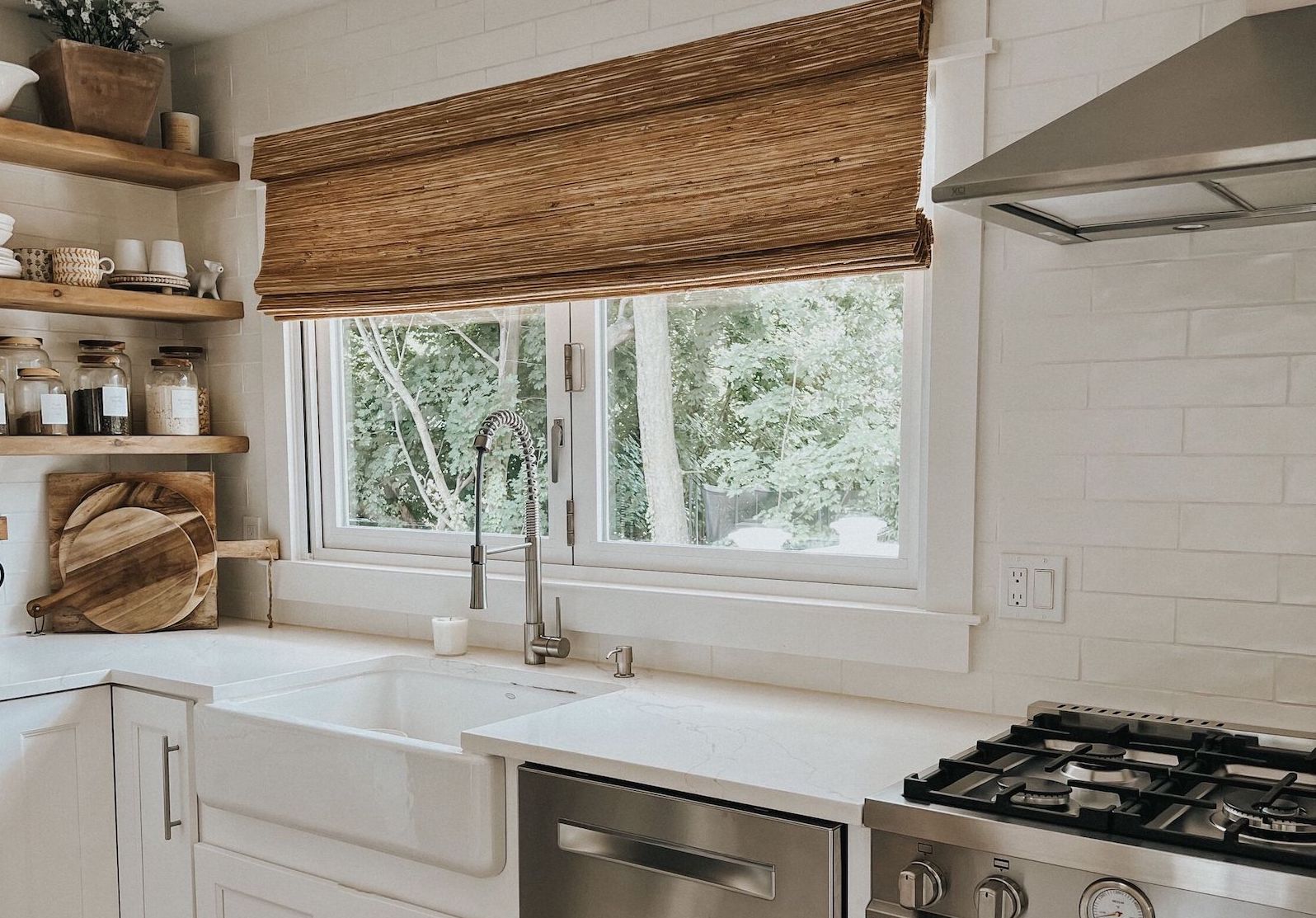Woven wood Jhonny Curran shades on kitchen window Woven wood Jhonny Curran shades on kitchen window