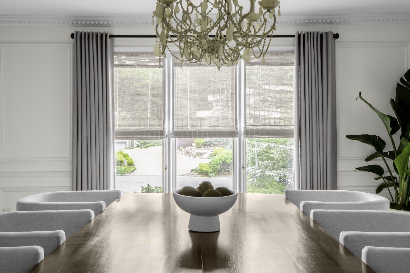 Unlined woven wood shades paired with drapery Unlined woven wood shades paired with drapery